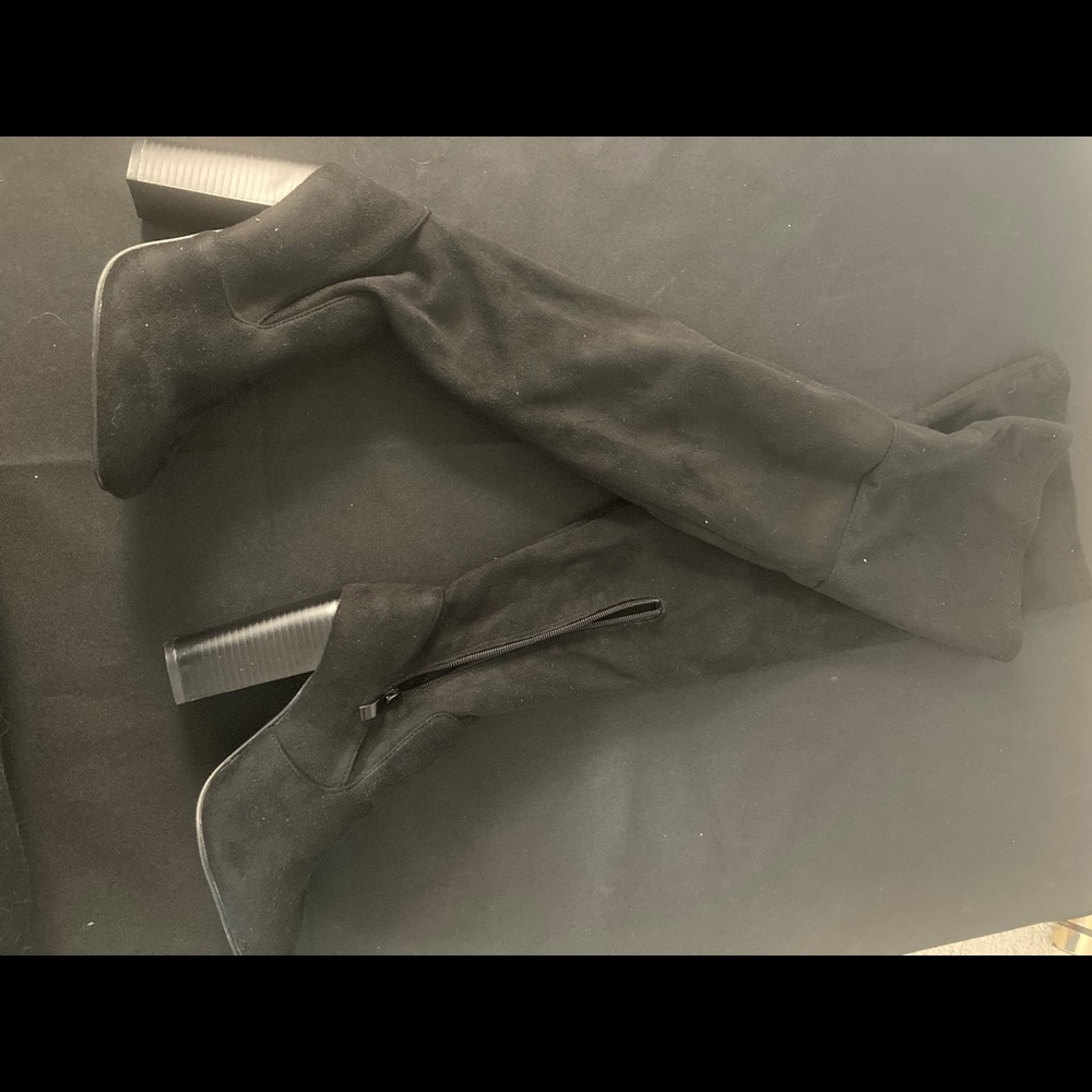Thigh high heeled boots